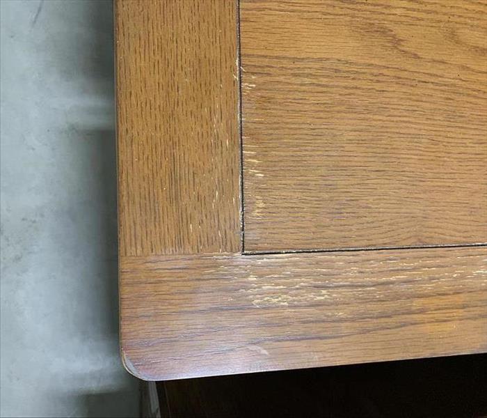 Wooden desk scraped and faded